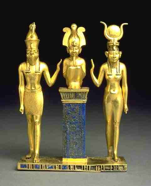 A gold statue of the Egyption gods Osiris, Isis and Horus